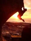 Late evening bouldering at Cae Dhu on the Lleyn Penisula. Dan Goodwin on Cae Dhu Crack, V7