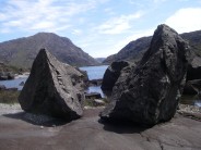 Split boulder on the side of Loch Coruisk, Skye