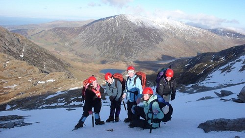 A party enjoying perfect neve on the slopes from Llyn y Cwn up to Glyder Fawr, normally a dull scree plod in summer.  © Mike Raine
