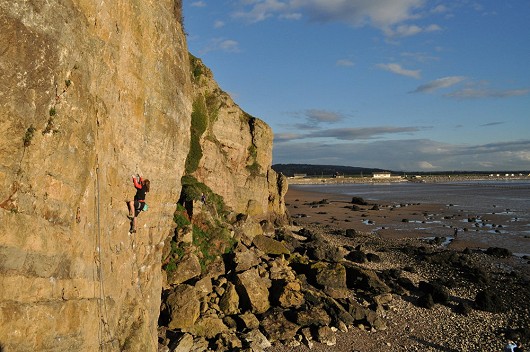 Claudia Hesleden redpointing 'Coral Sea' f6c, Boulder Cove, Brean Down.   © _m.cox_