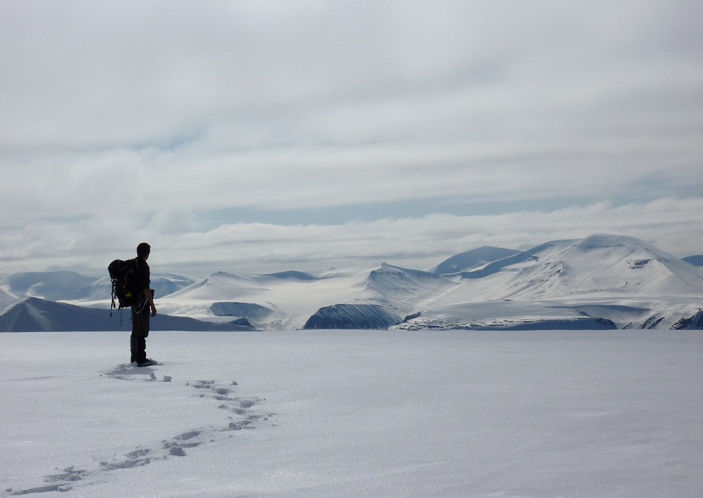 Summit of Louisfjellet, looking out to Oscar II Land, Svalbard  © Rosey Grant