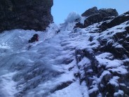 Unknown climber on South Gully's main ice pitch