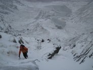 Heading up the final snow gulley of Idwal Stream
