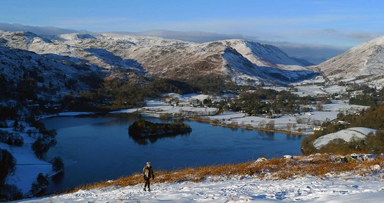 Walker on her way to Loughrigg summit from Grasmere.  © Mick Ryan