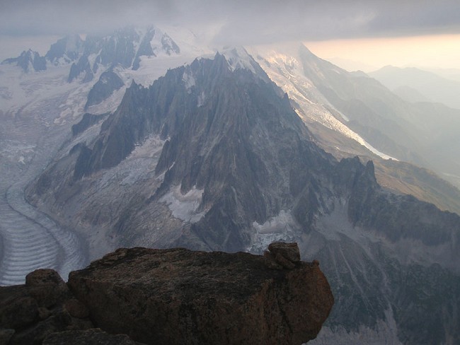 The view from the summit of the Grand Dru - bad weather clearly visible.  © Charlie Boscoe