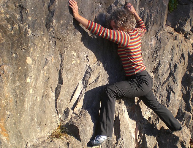 Checking out the stretchiness on warm winter rock  © Sarah Flint