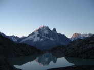 The sun rises over the Aiguille Verte from a bivvy above le Lac Blanc