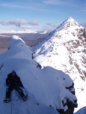Davey Moy taking a moment on the Pinnacles Liathach  © Nick Carter