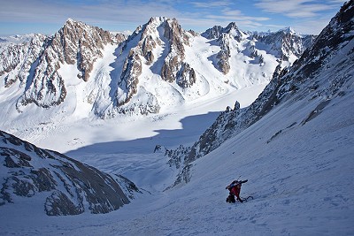 High up on the Couturier Couloir, skis on the back  © Jon Griffith