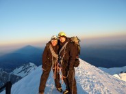 Me and the old man on the summit of Mont Blanc as the sun rises.
