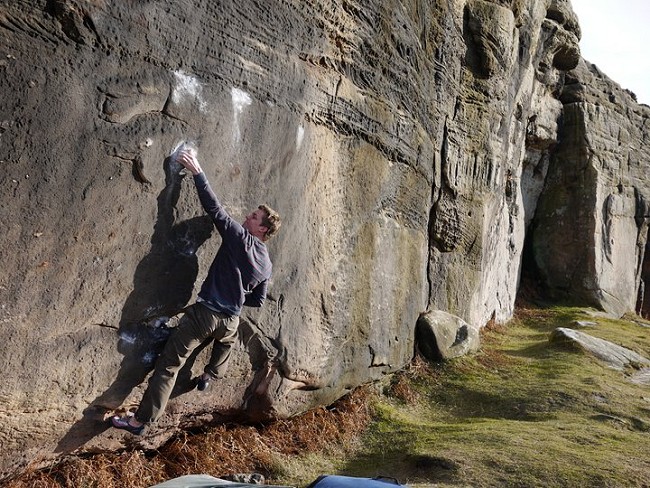 Micky Page climbing the sit start to Working Class  © Martin Smith