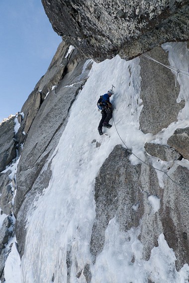 Matt Perrier climbing the crux ice pitch of Fil a Plomb in good conditions.  © Jack Geldard