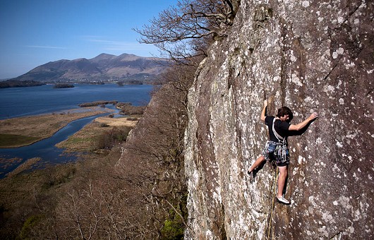 Tom on the lower crux of Aaros. Borrowdale provides the backdrop.  © neil the weak