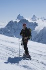 Neil Phillips on the summit col of Pigne d'Arolla (Matterhorn in the distance)