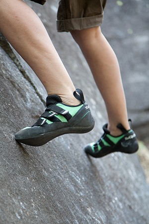 Standing on tiny holds in a new pair of rock shoes  © Jack Geldard