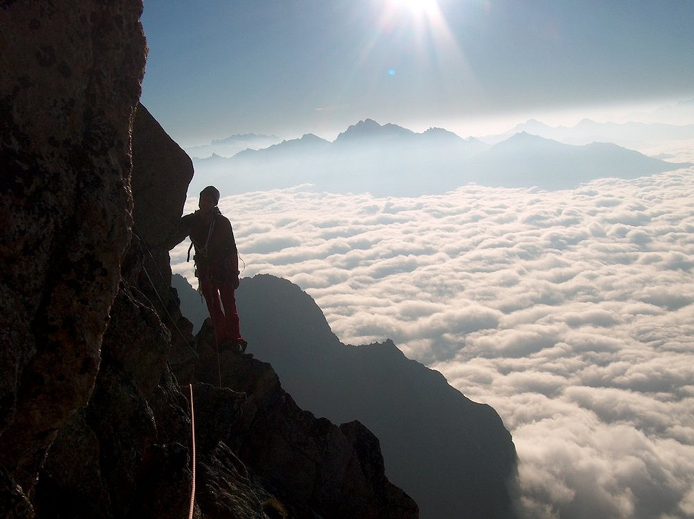 Above the clouds low down on the S Ridge on the Aiguille Noire  © Steve Ashworth