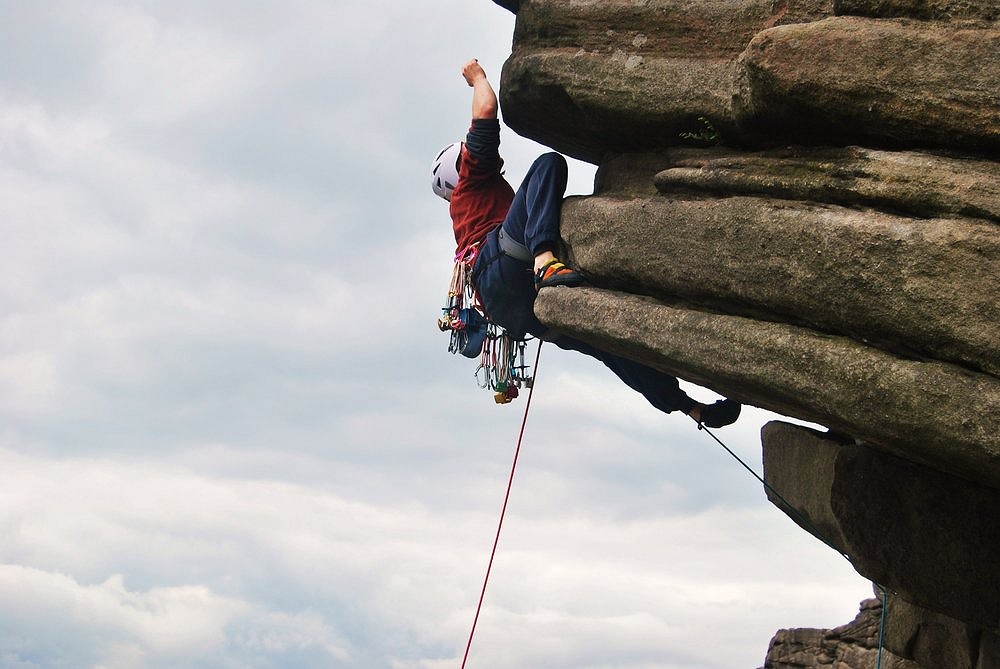 Paul Windross exiting the crux of Flying Buttress Direct HVS 5c, Stanage  © Chris Ellyatt