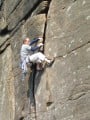 Paddy laybacking Right Unconquerable (HVS), Stanage