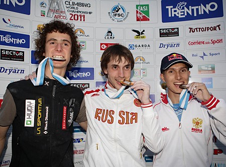 L-R: Adam Ondra (2nd), Dmitry Sharafutdinov (1st) and Rustam Gelmanov (3rd)  © Arco 2011