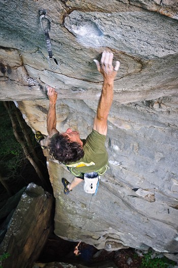 Russ Clune on the crux dyno move of Fuel Injector (5.13b).  © Alex Buisse