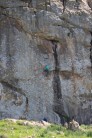 Technical start leads to easier climbing off flake and bouldery finish. Crux up top