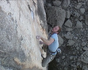 Neil Dyer making the first ascent of Megalopa - 8c+ - LPT  © Chris Doyle (Still Shot from Video)