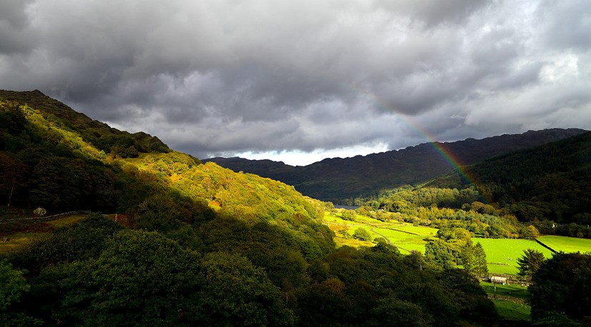 At the end of the day, a rainbow lifts the spirits after frequent squally showers dampen ambition.  Nant Gwynant.  © David Dear