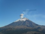 Popocatepetl 5400+m, letting off steam, seen from Iztaccihuatl<br>© Martin Haworth