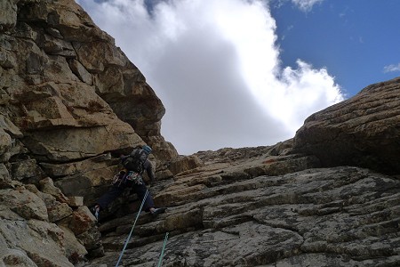 Joe on the 8th pitch of the big wall near base camp in the Raru Valley.  © Virgil Scott