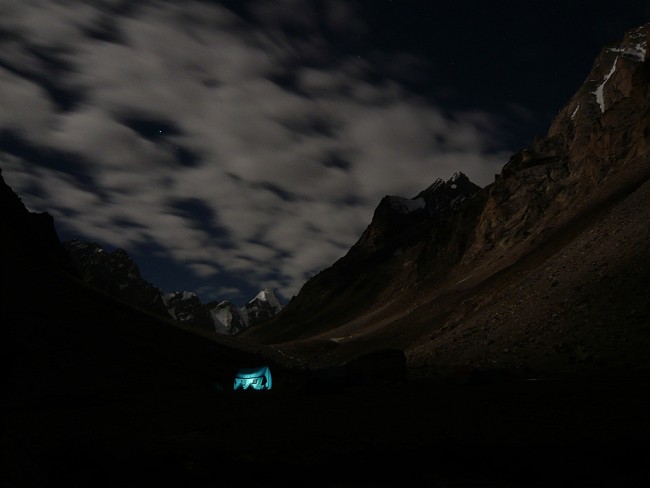 Base camp at night, with the attempted spur visible high on the right.  © Joe Prinold