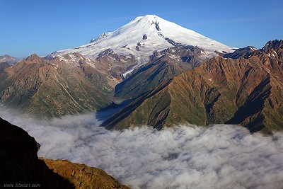 Climbing in Caucasus, Central MNR peak with Mt. Elbrus Grandeuer on background  © VladimirKopylov