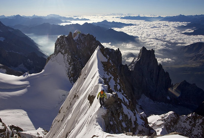 Balancing act on the stunning snow arete of the Innominata- Mont Blanc S face. One of my favourite shots  © Jon Griffith