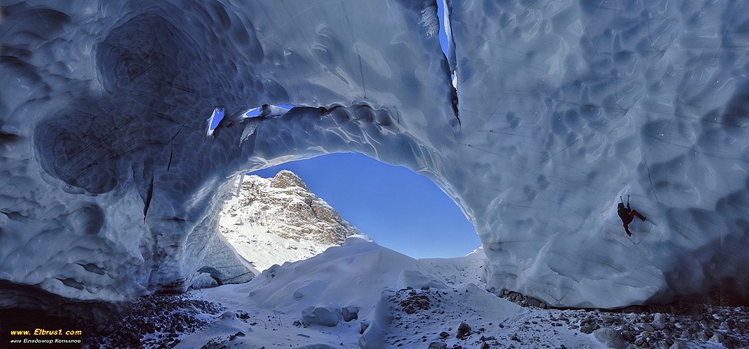 ice climbing in glacier icy cave  © VladimirKopylov