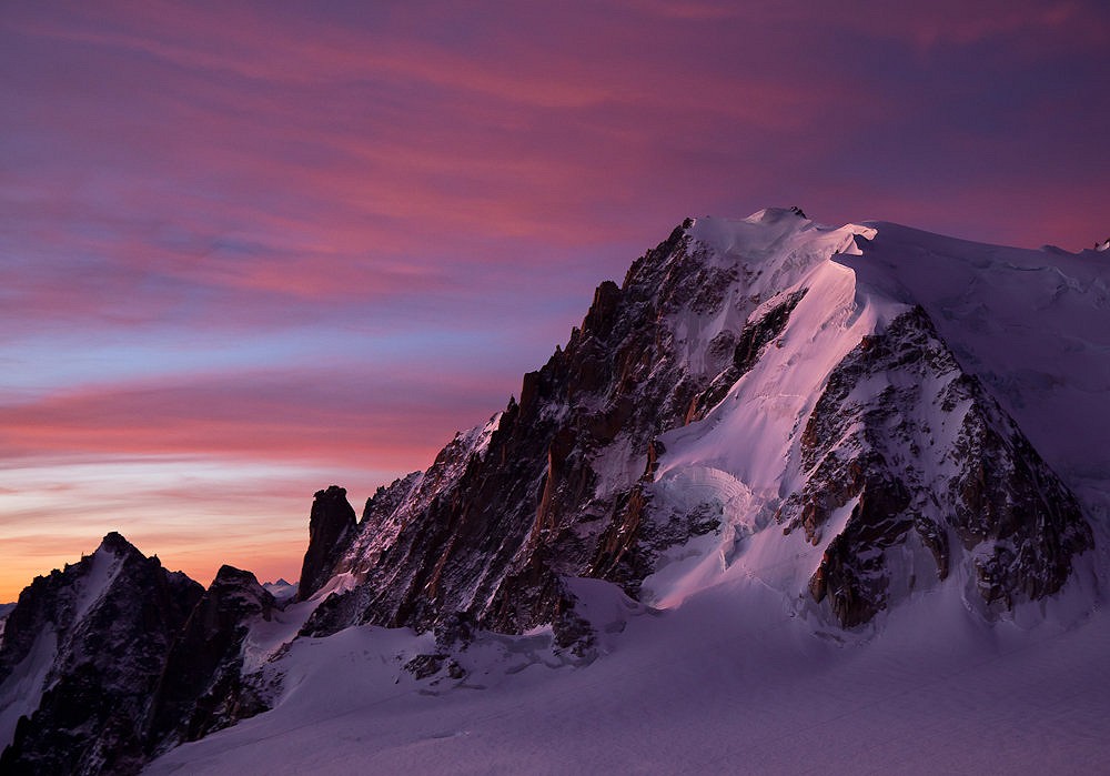 Colourful sunrise on Mt. Blanc du Tacul in October.  © Ulrik Hasemann