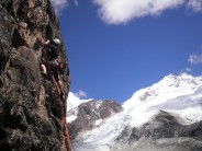 Climbing under the gaze of a 6000m giant of the Cordillera Real, Bolivia