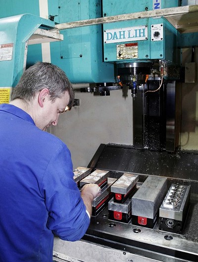 Kevin Edwards clamping components in Chick Multi-Lok vices on a Dah Lih MC-720 vertical machining centre at Llanberis  © Chris Wright