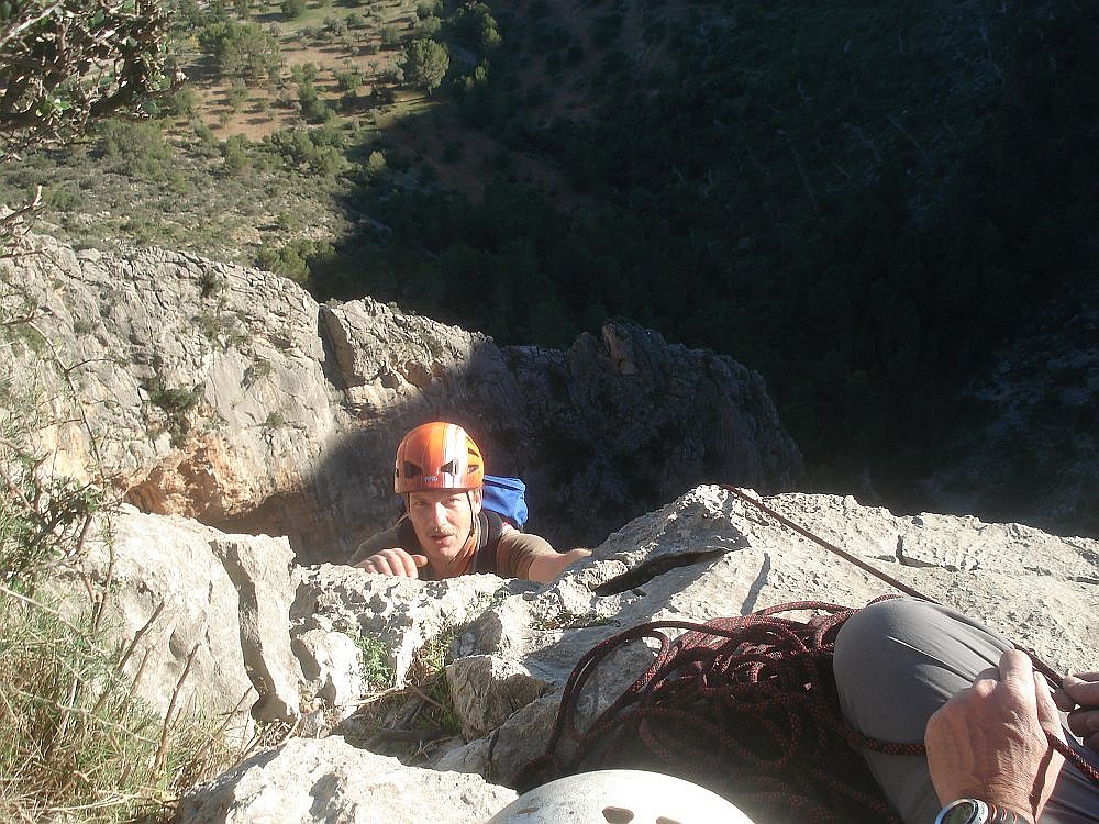 Karsten just reaching the summit of "Albahida" (4+) at Sa Gubia (Mallorca)  © Karsten