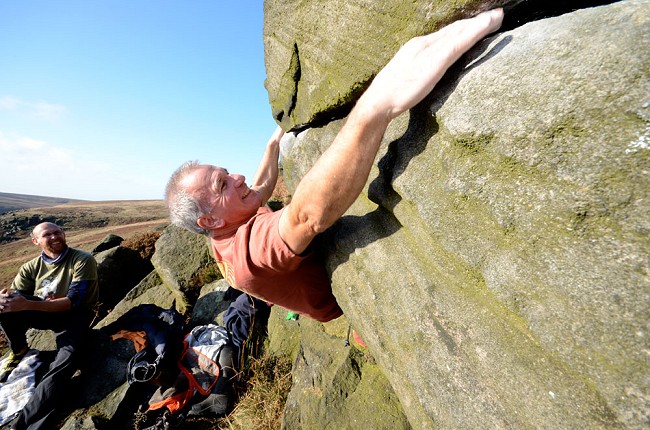 Jerry Peel, one of the pioneers of modern bouldering, strutting his stuff on a cold but sunny day.  © Mick Ryan