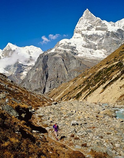 Passing Dig Kharka in the Ingkhu Valley, en-route to Mera Peak, Nepal, with Kyashar Peak (Tangtse) in the background.  © Stuart Scott