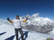 On the summit of Ama Dablam on my daughter's birthday, Everest in the background.