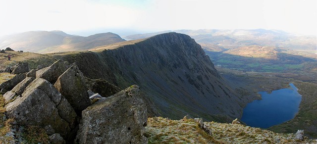 Cyfrwy arete from the summit of Cadair Idris looking towards Barmouth on a cold and hazy winter's day  © deejmonkey