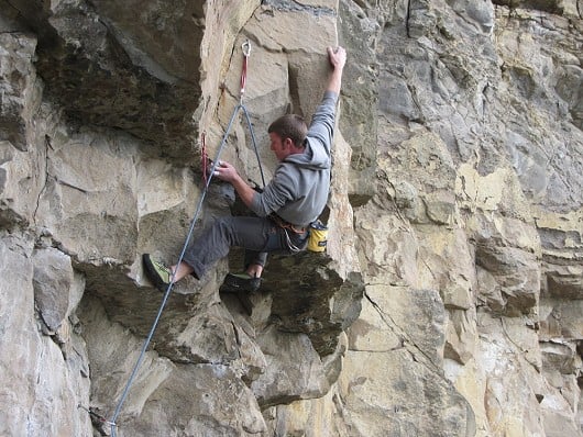 Working a knee bar which eases the crux a bit; so I hear.  © Bisset