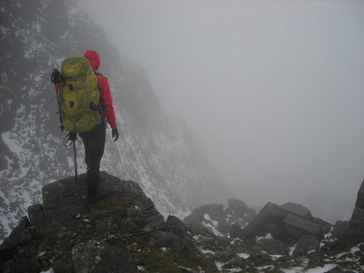 Looking out across an outcrop on a foggy great gable ascent  © John Pierre