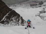 Cally topping out her first winter climb!