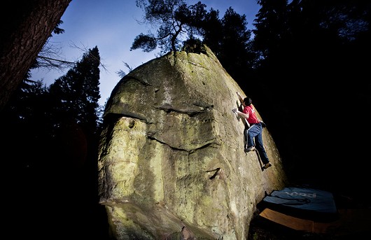 Eddie Barbour bouldering in the evening, on The Nadser at Kyloe.  © Sean Bell