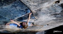 Gabina cranks chalk free towards the saving jug - route Requiem (IXb), Prachov Rocks, Czech Paradise