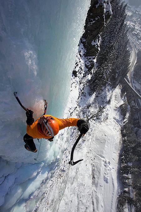Ueli Steck on the classic WI5 of Les Houches, Chamonix Valley, using the Petzl Nomic axes  © Jon Griffith / Alpine Exposures
