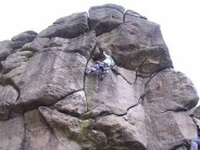 BrianT on Great Western at the Almscliff Rocktalk picnic, belayed by Sloper.