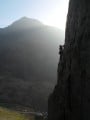 Don't look down!  Dave Atkinson leads on spiral stairs, Snowdonia, on a gloriously sunny spring day