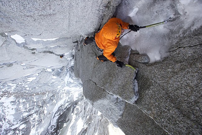 Jesse Huey 'having it' up the steep crux pitch of the Dru North Couloir Direct.  © Jon Griffith / Alpine Exposures